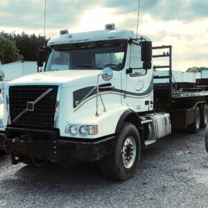 .  Volvo VHD, 2013, 12.8L D13, AT-AB, 6x4, Roll-Off, 25ft 5in Hoist, w/ Flatbed on the rails, r, N#8951