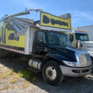 .  International 4300, 2016, Cummins 6.7, AT-HB, black, w/ Damaged yellow Dry Box, N#8202